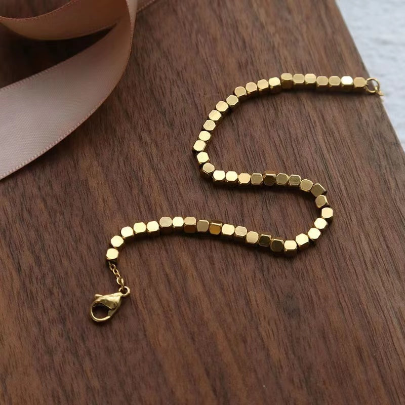 Unique gold blocks bracelet