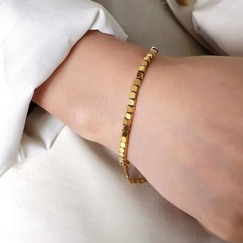 Unique gold blocks bracelet