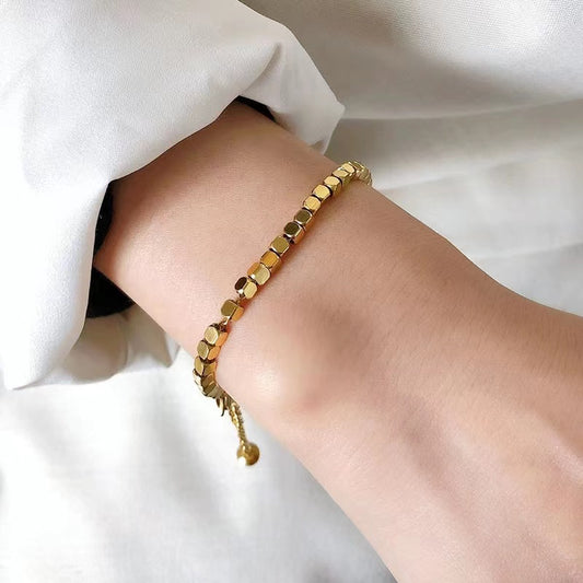 Unique gold blocks bracelet