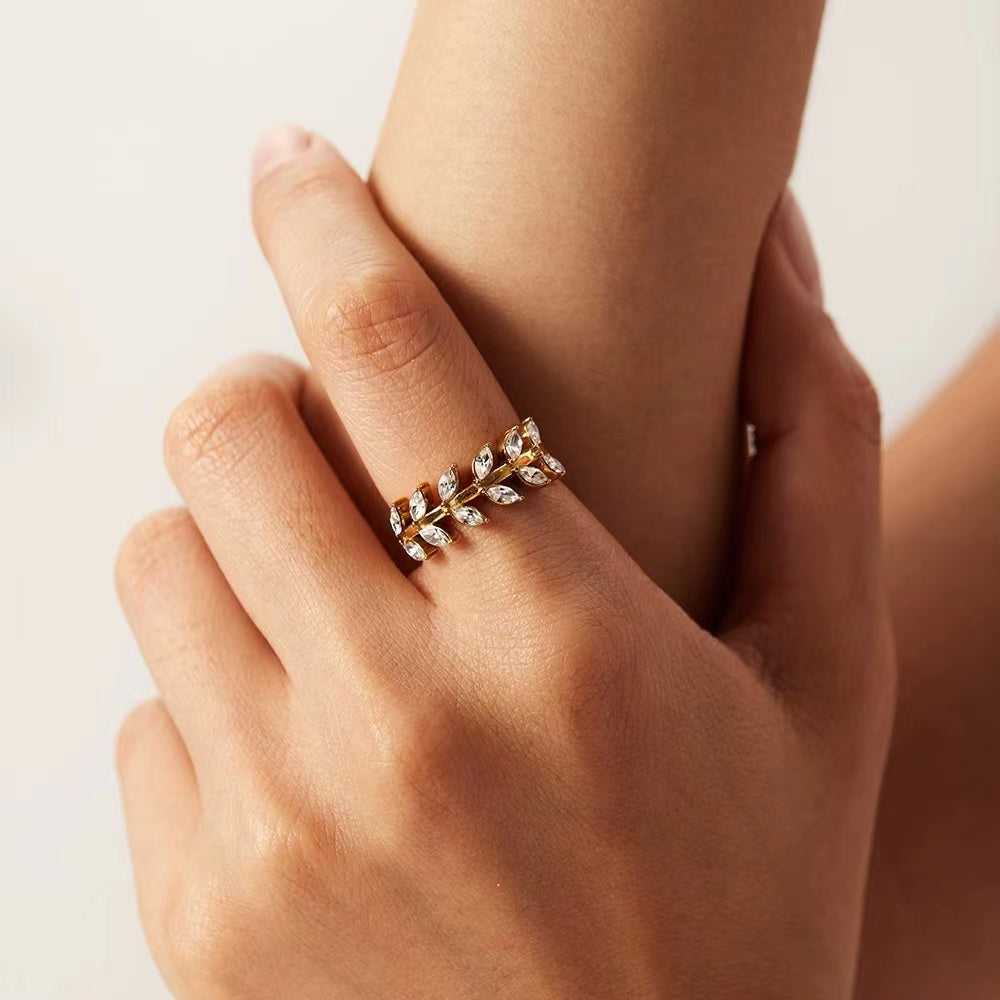 18K Gold Plating ring featuring leaves shape of CZ stone