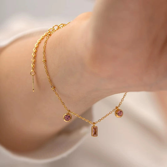A dazzling pink emerald-cut stone bracelet and necklace sets