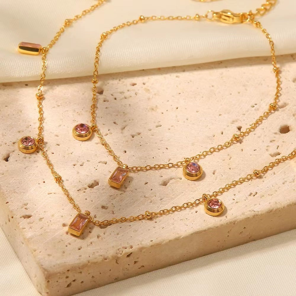 A dazzling pink emerald-cut stone bracelet and necklace sets